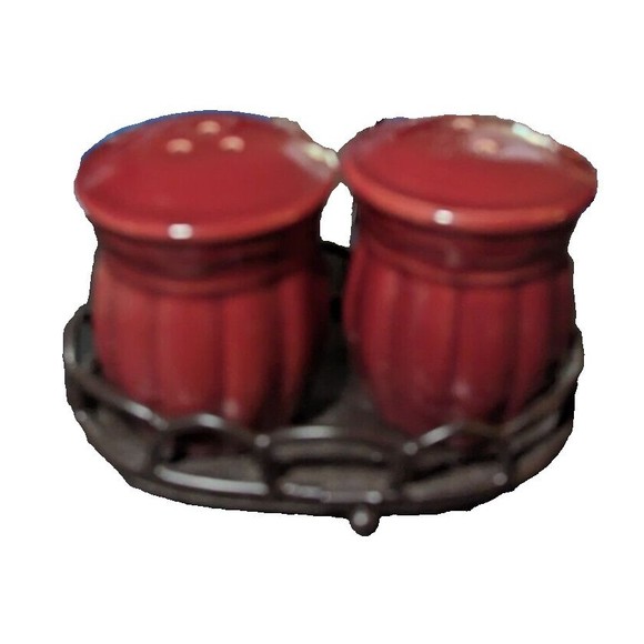 Cranberry colored salt and pepper shakers in metal holding rack - Picture 3 of 3